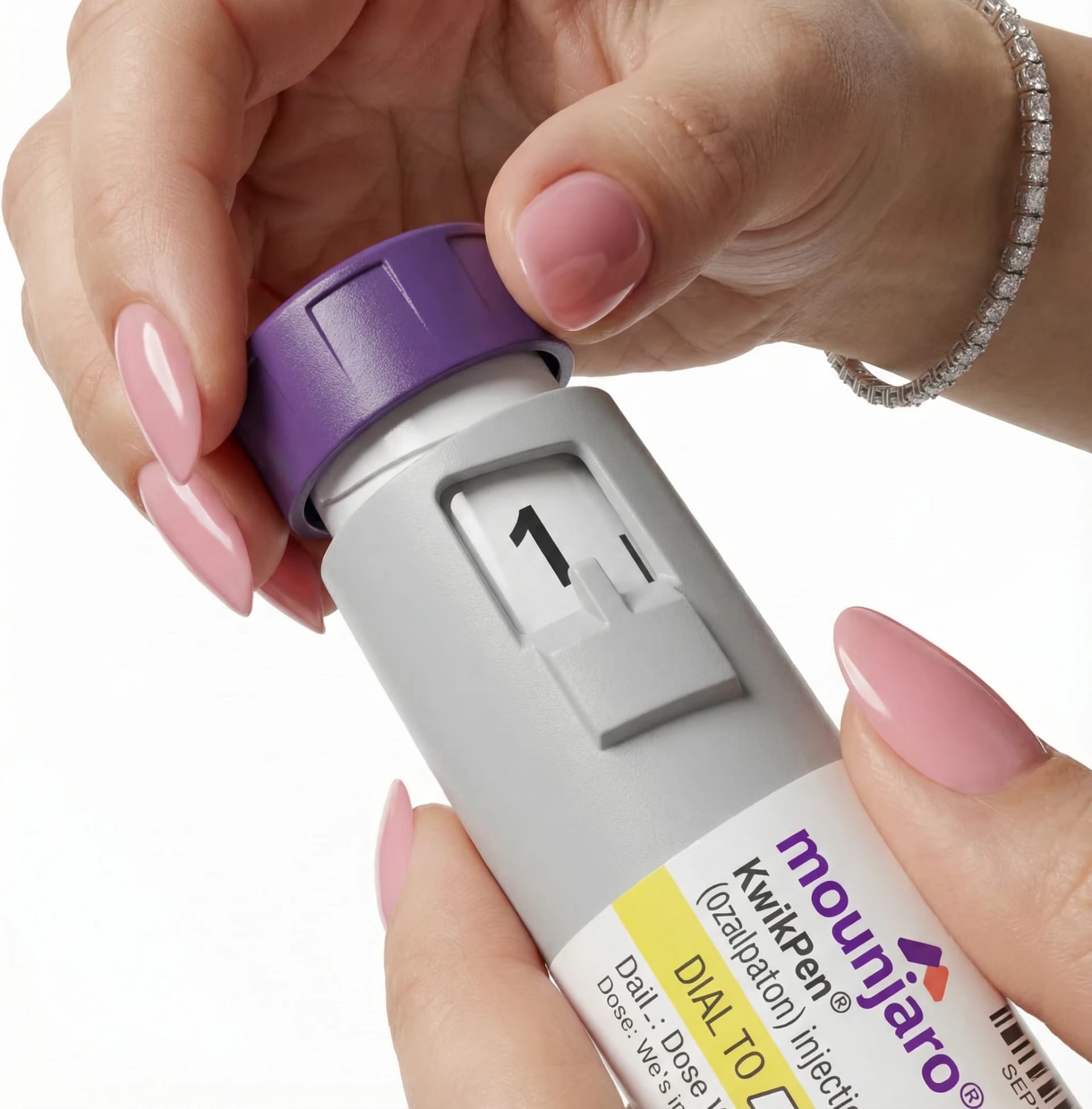 Крок І2 — встановлення дози Mounjaro KwikPen: поворот кнопки дозування до символу ① перед ін'єкцією тирзепатіду